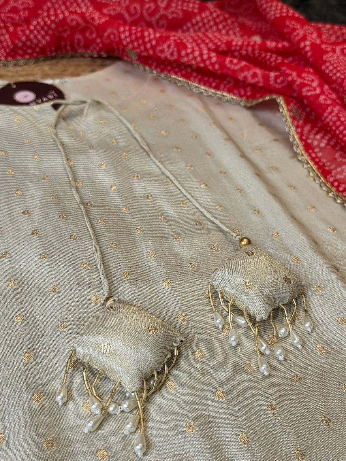 Silk Cotton Ivory Kurta Pant Set with Red Bandhej Print Dupatta